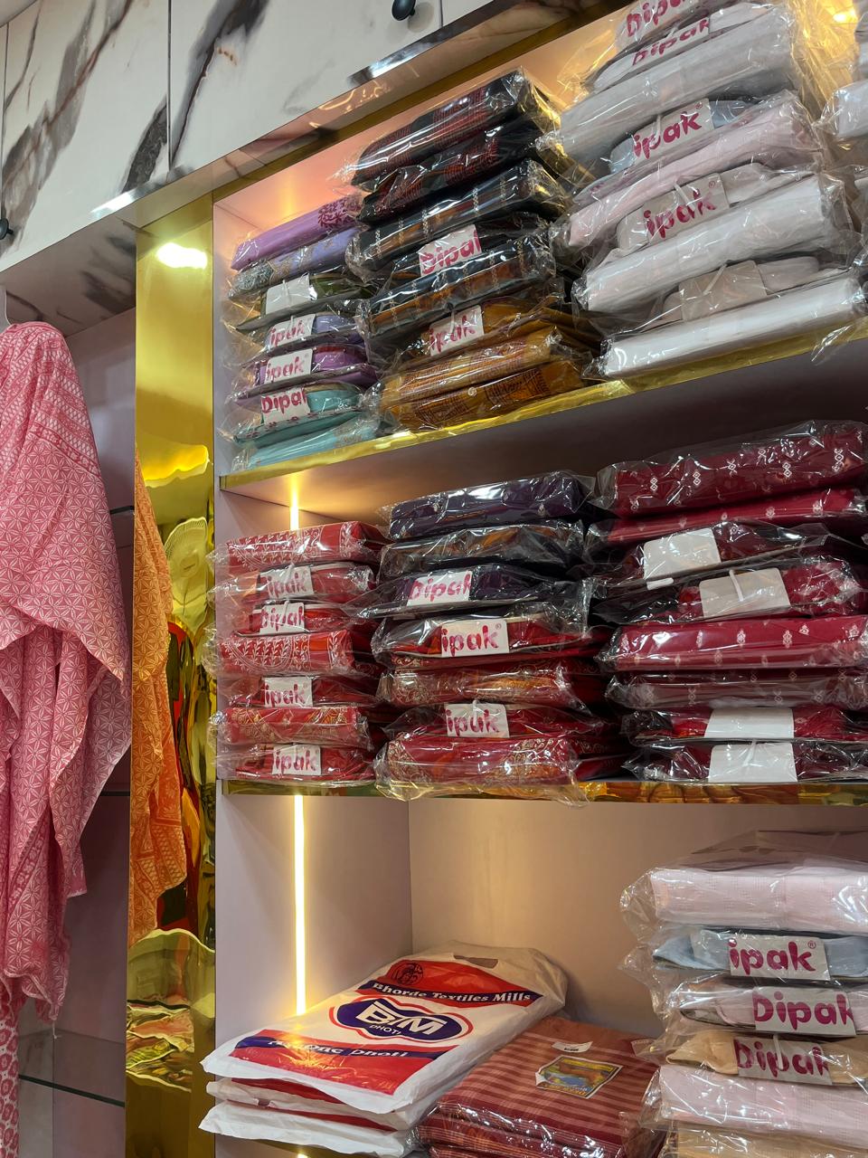 Backlit saree storage shelves
