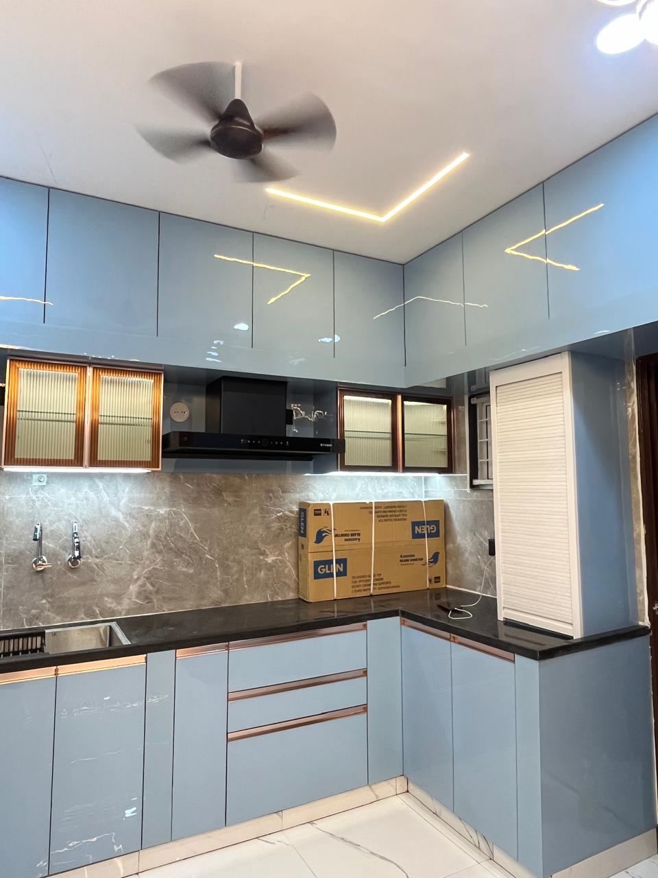 L-shaped modular kitchen in powder blue