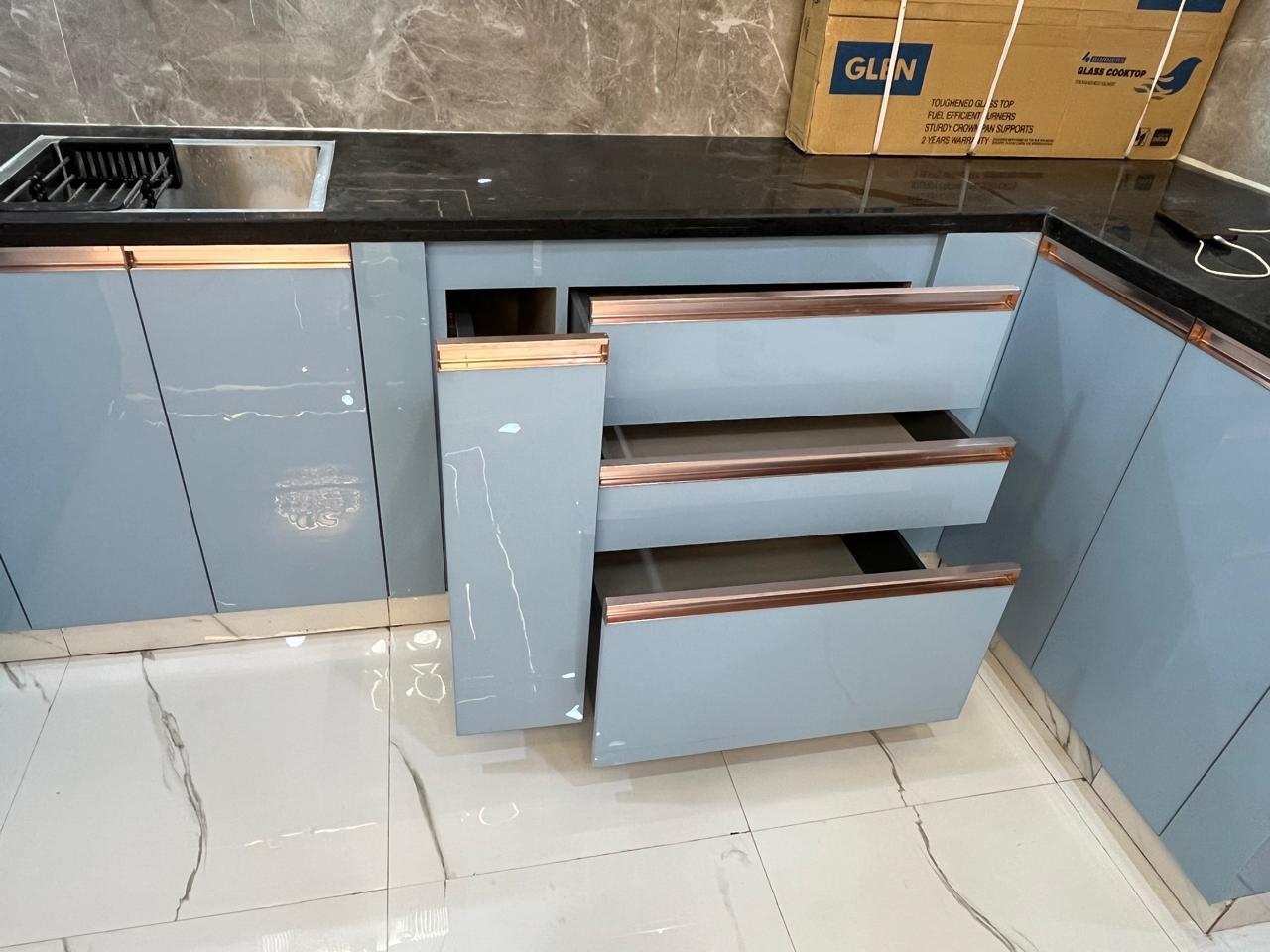 Soft-close kitchen drawers with rose-gold handles