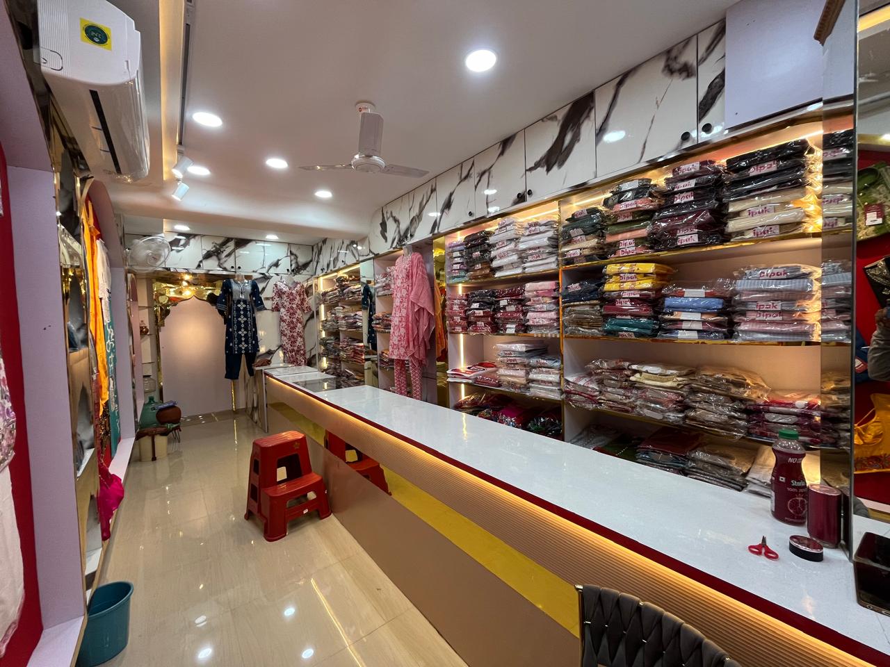 Long boutique aisle with billing counter
