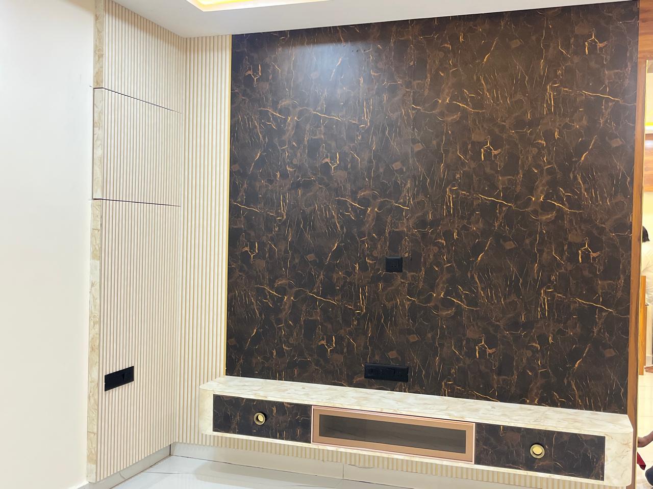 Bedroom TV unit with marble feature wall